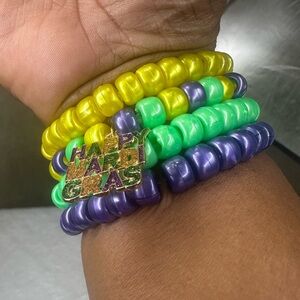 New handmade purple, green and gold pony bead bracelet set.